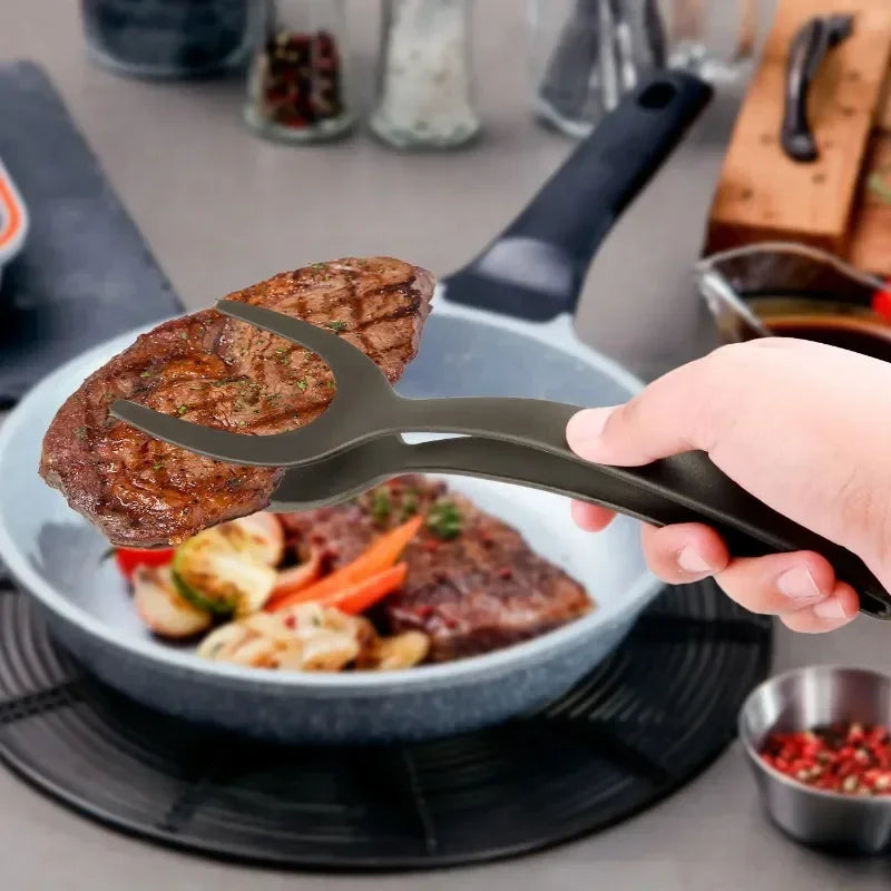 Pince de cuisine 2 en 1 avec spatule intégrée